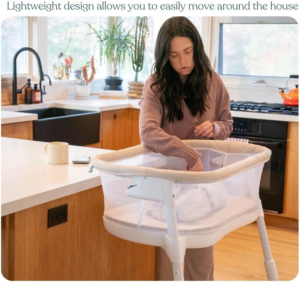 imageHALO BassiNest Lite Breathable Baby Bassinet Slides Over Bed with Mesh Walls for Airflow amp Visibility Lowering Wall for Easy Access Portable amp Lightweight Fits Most Beds